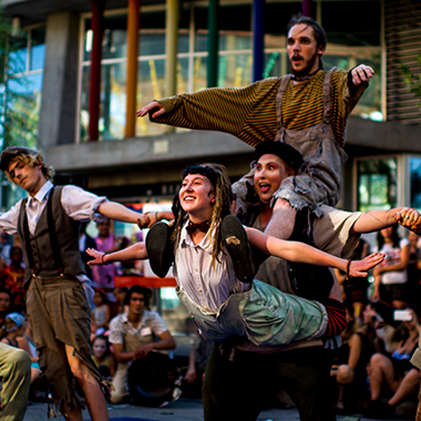 Young participants perform in the street