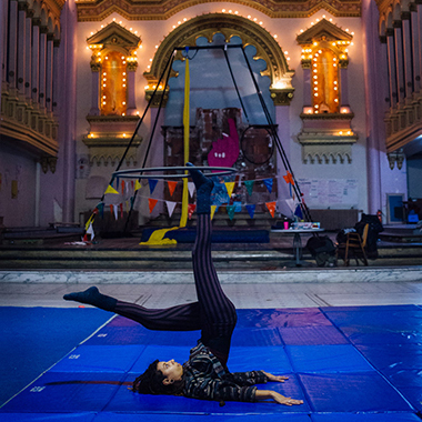 Circus artist training with a hula hoop